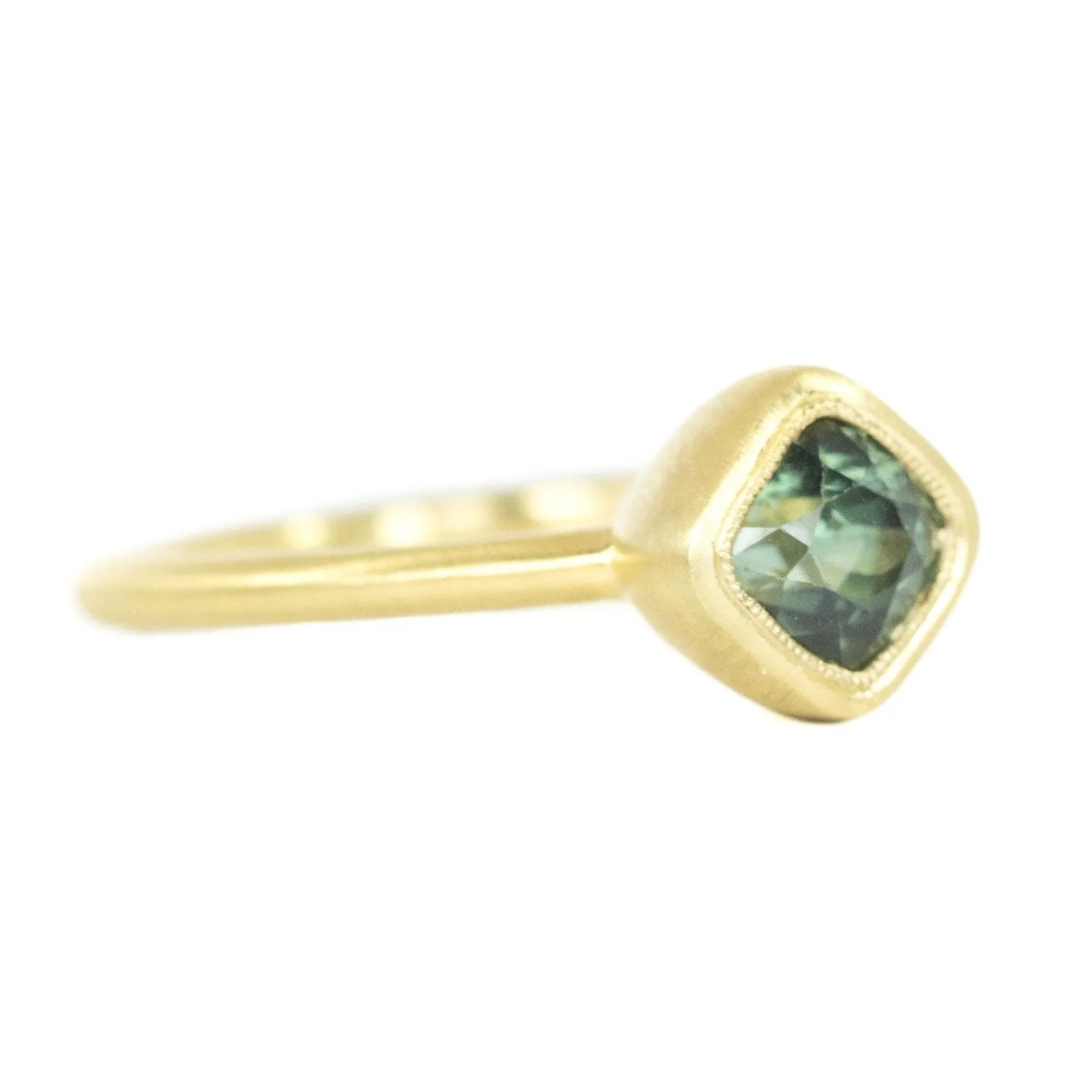 1.56ct Cushion Cut Sapphire With Milgrain Bezel Set In 18k Yellow Gold Brushed Finish