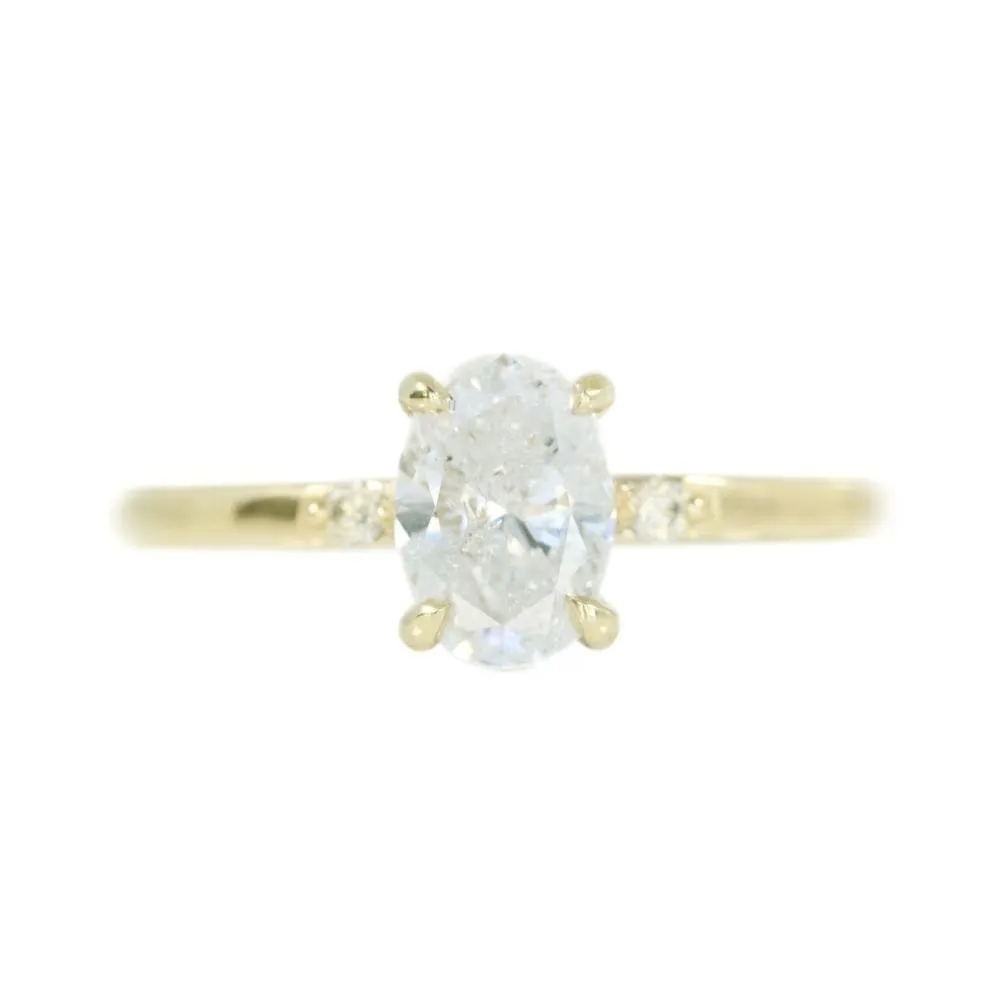 1ct Oval White Diamond dainty three-stone ring in 14k Yellow Gold